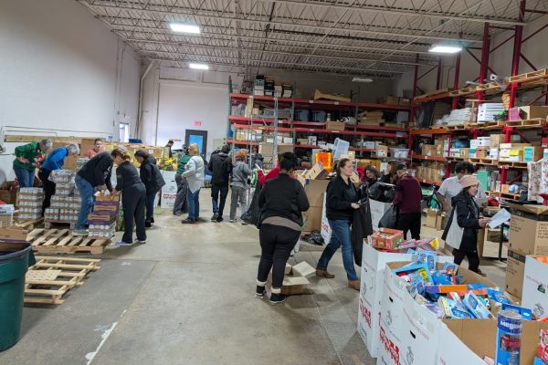 Volunteers assembling Christmas Baskets